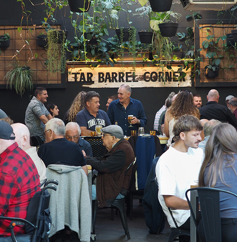 Tar barrel full to the brim with happy customers