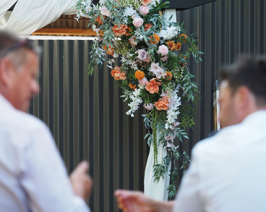 Flower arch at a wedding at Tar Barrel