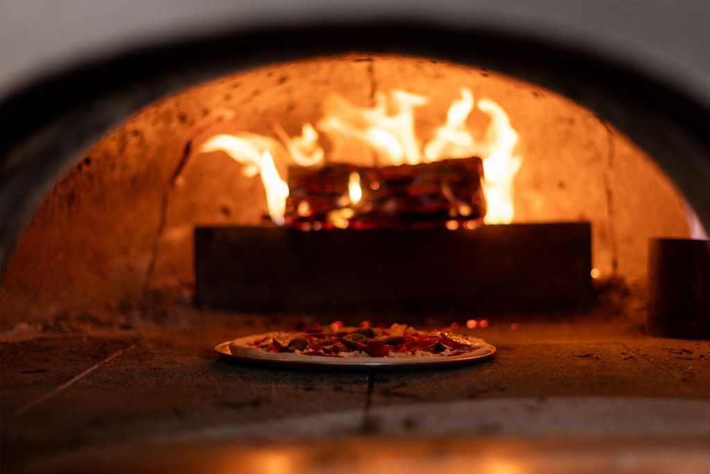 pizza in wood fired oven